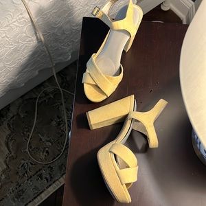 Worn only once! Pale yellow suede, 4 1/2 inch heel 3 1/2 inch front platform